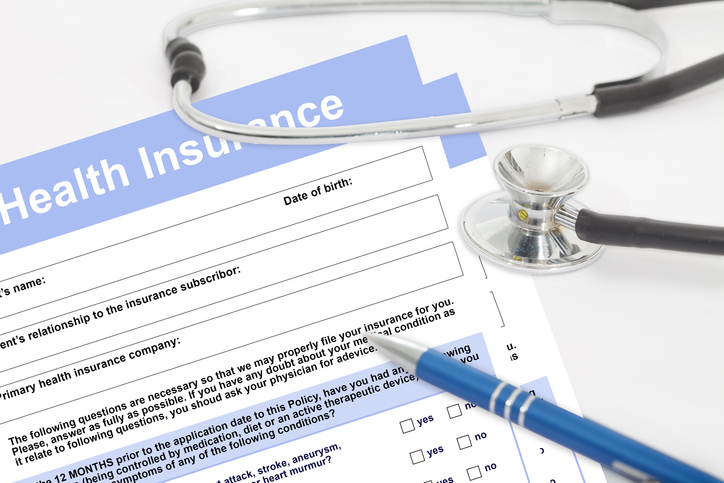 Health insurance form with stethoscope. Blank medical questionnaire. Health insurance concept.