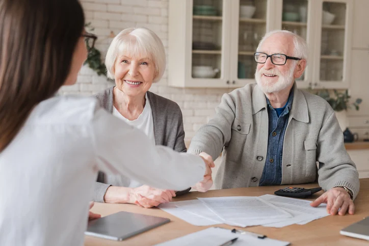 elder couple with lawyer discussing will