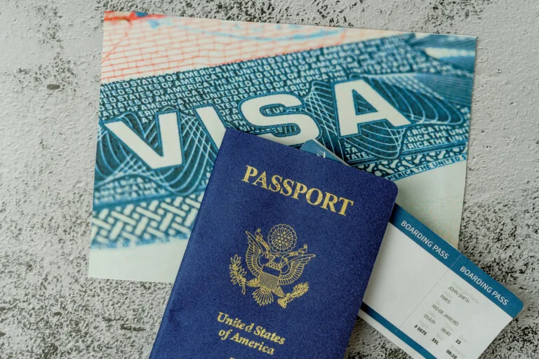 US passport, boarding pass and visa ready for travel